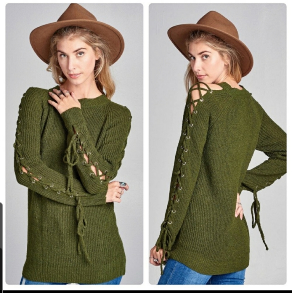 Look at this incredible trendy tie sleeved sweater